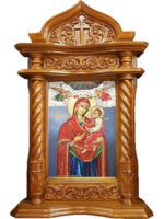 carved wooden icon with patina
